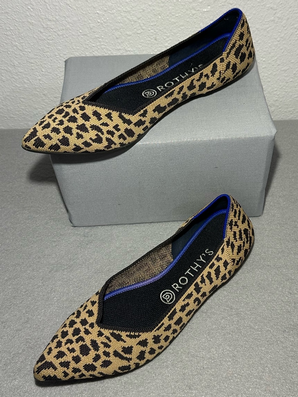 Rothy's The Point flats in a classic leopard animal print.